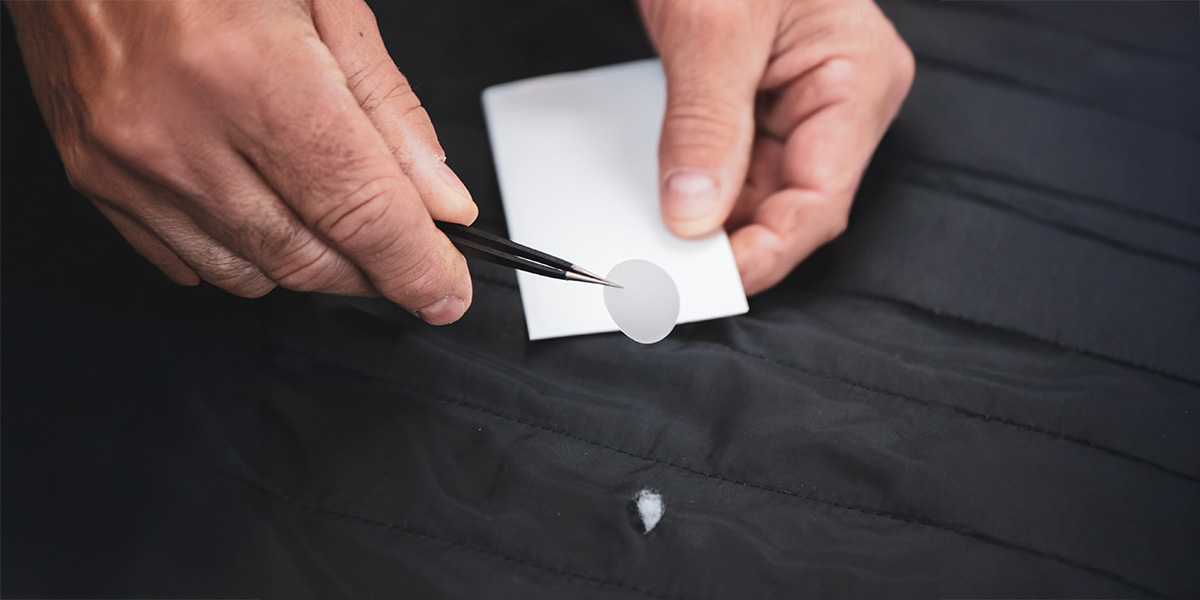 Repairing a tent with TUFF Tape